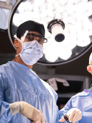 Two surgeons in the middle of a surgery