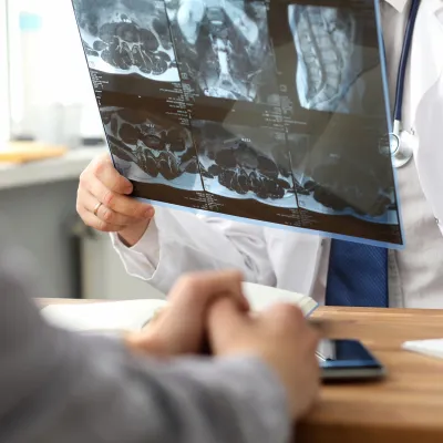 A doctor discussing a scan to a patient