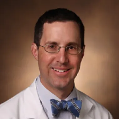 A headshot of Dr. Perri, Roman