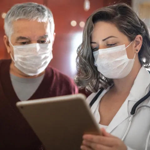 Two doctors in masks. 