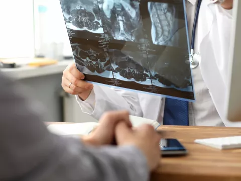 A doctor discussing a scan to a patient